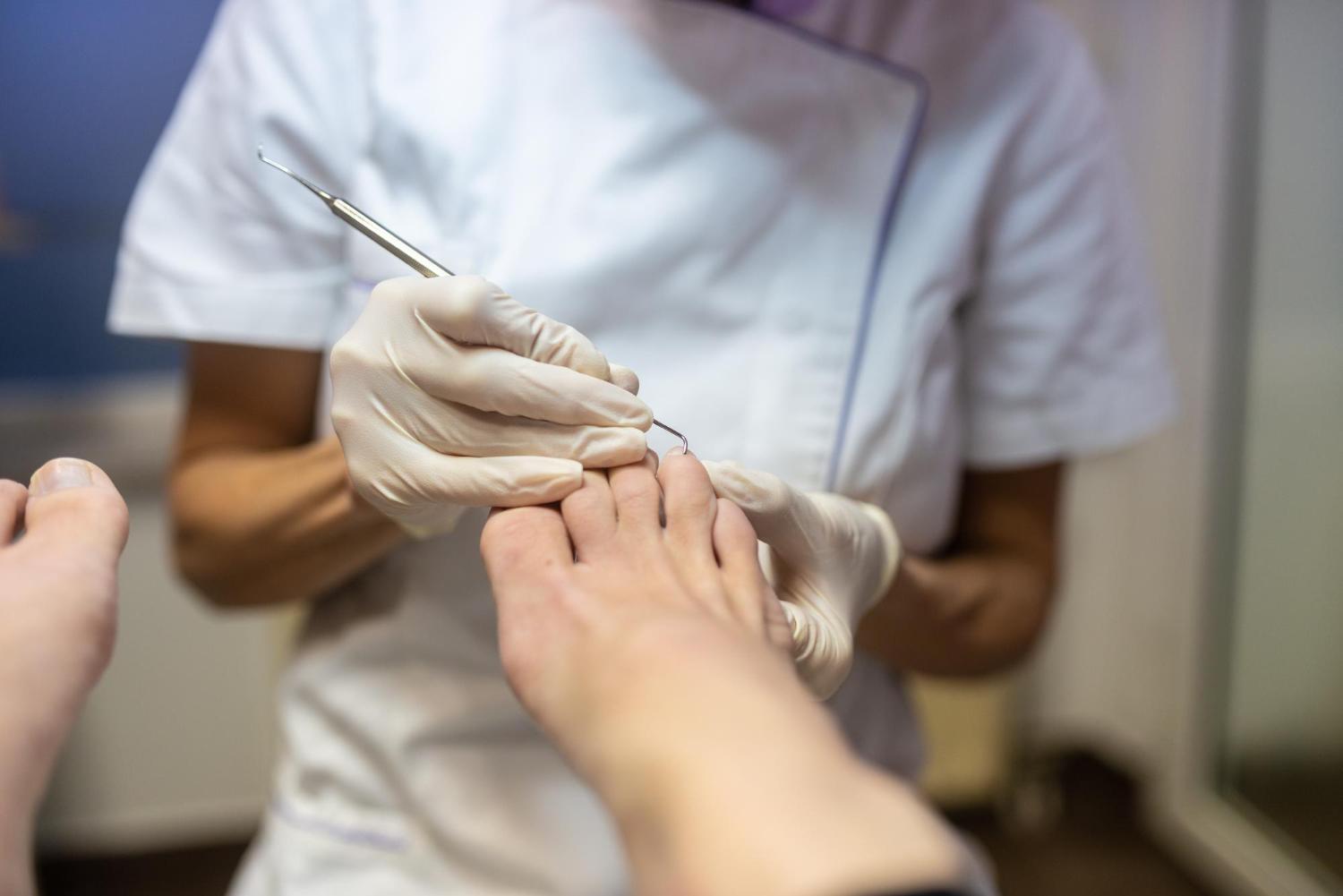 Close up of professional nail care being carried out on a toenail